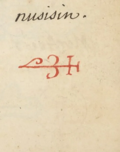 El mismo carácter de Musisin, dibujado a mano en tinta roja y verde en «L'Art Magique» (Wellcome MS.983, ~1709) — el testigo francés más cercano al Grimorium Verum impreso. Dominio público.